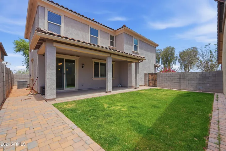 Backyard and extended covered patio, extended pavers, real grass, sprinkler system