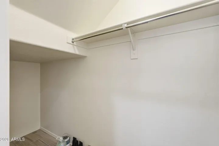 Under the stairs closet downstairs