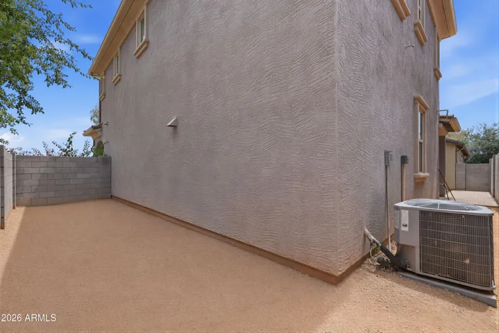 Additional side-yard, perfect for a dog area or storage