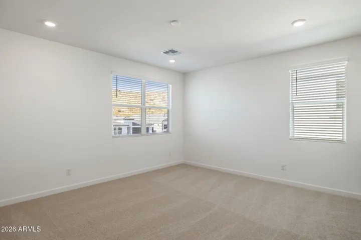 "Disclaimer: The images shown are for illustrative purposes only and depict a similar home design from a previous project. Actual features, finishes, and colors may vary in the new construction. Please consult with our team for specific details regarding this home."