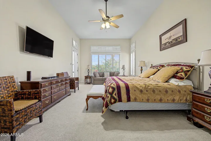 Huge master bedroom with door to backyard