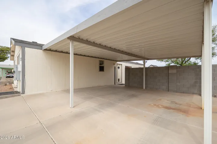 WIDE DOUBLE CARPORT.