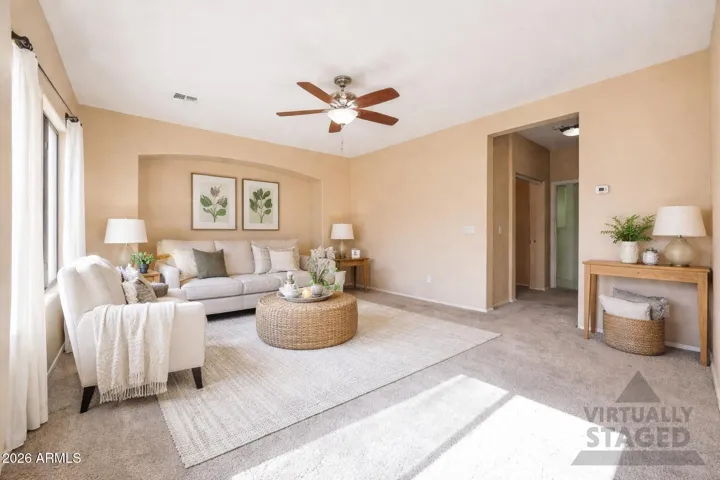 Light filled family room adjacent to kitchen with eating area.
