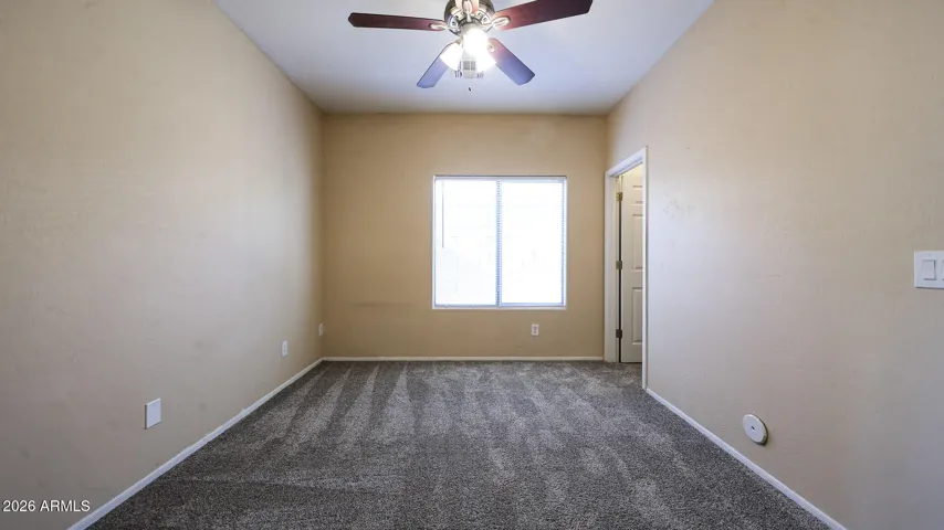 Located on the main floor, this bedroom could also be used as a den.