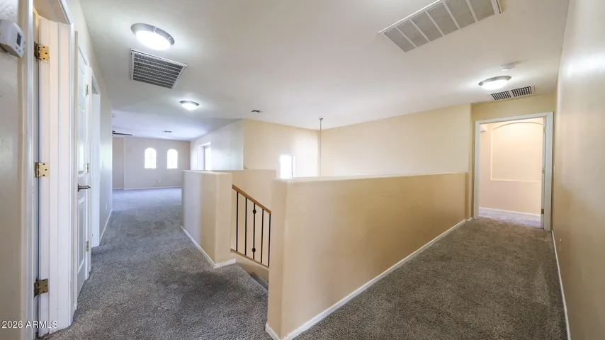 As you enter the second floor, there is a large bonus room, three bedrooms and a full bath. The primary suite is off on the other side of the home.