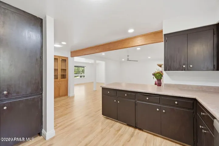 Kitchen has lots of storage, counter space.