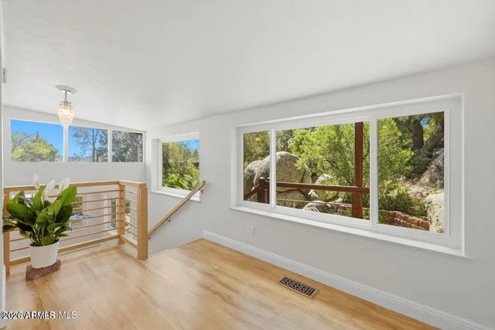 Sunny space leading to lower level. Perfect for plants.