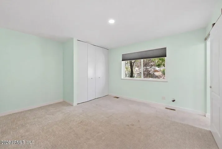 This bedroom has ensuite bathroom, spacious closet.