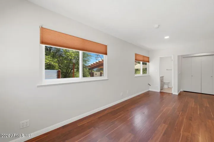 Bathed in natural light with closet and 1/2 bath.