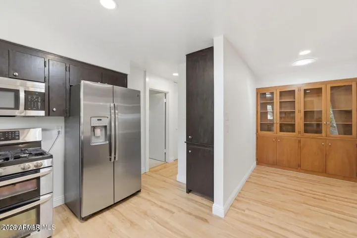Dining Area features original built in cabinet.