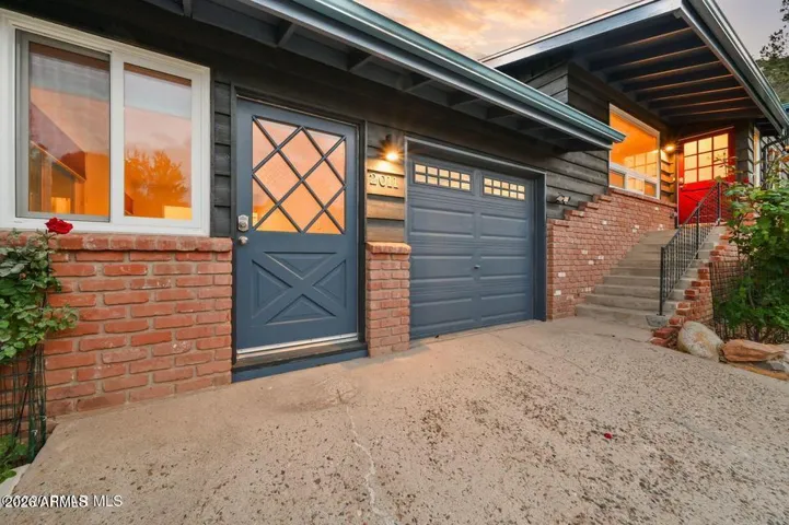 Entrance to Lower Level and 1 Car Garage.