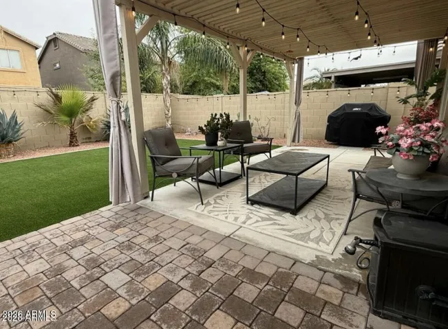 Take your shoes off and relax after work in this amazing backyard!