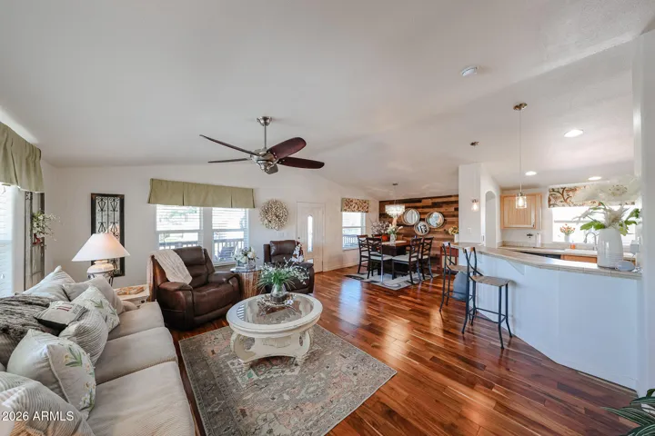 breakfast bar on right opens into kitchen