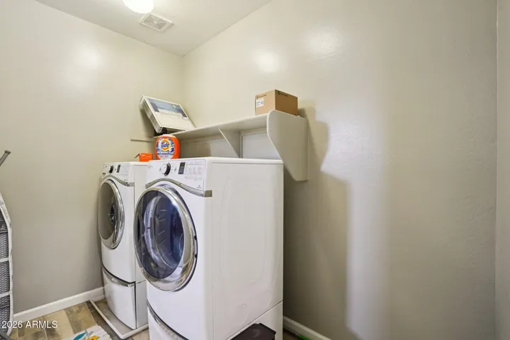 Access to the laundry room from the primary bedroom also!