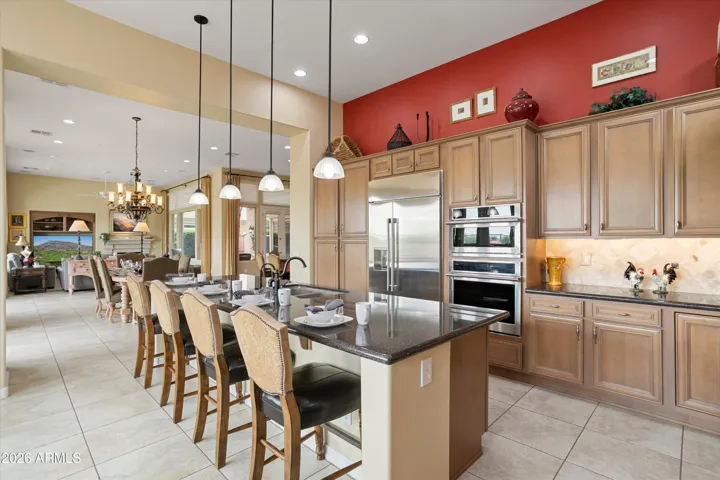 GE MONOGRAM APPLIANCES , GRANITE SLAB COUNTERTOPS, ABUNDANT CABINETS