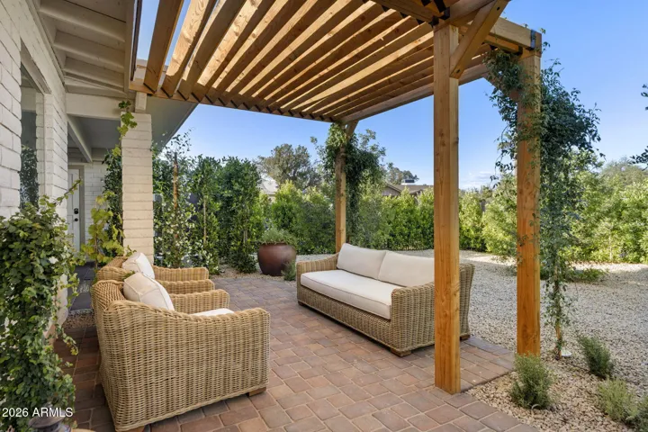 Front patio w/ grapevine (plated) covered terrace