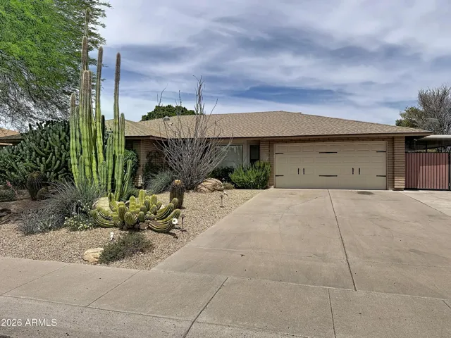 Block home with 2 car garage and RV gate/carport