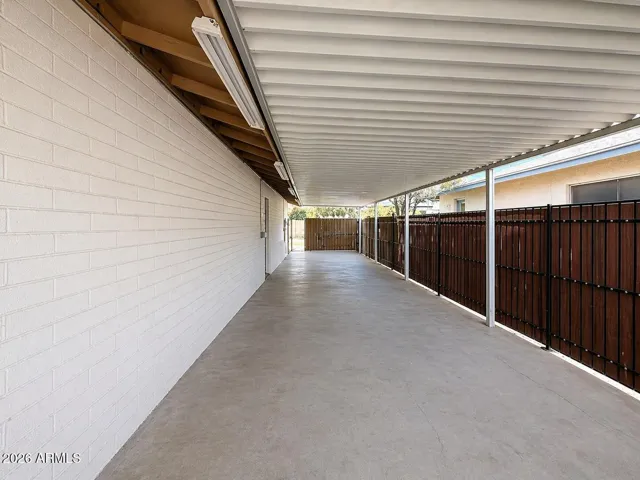 Tandem carport with electrical and lighting.