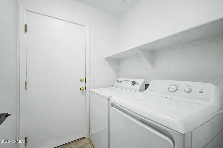 Laundry room with washer and dryer