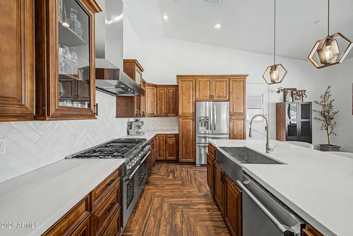 Spacious kitchen with stainless appliances and large kitchen island