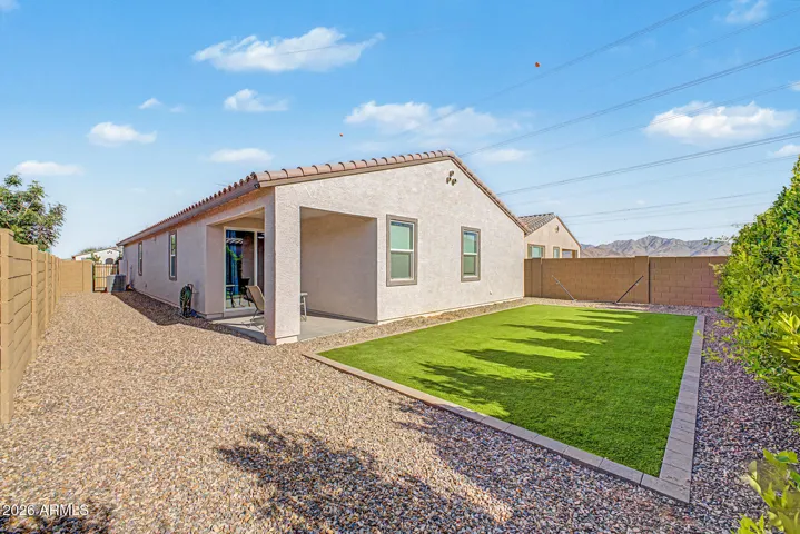 Fully landscaped backyard on corner lot