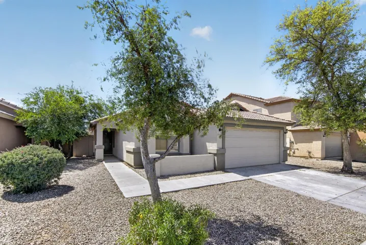 Spacious attached garage offering secure parking and excellent additional storage options for your outdoor gear and tools.