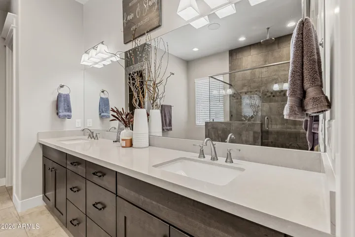 Luxurious Primary Bath with large walk-in closet.