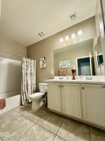 Upstairs Double Vanity and Tub Shower