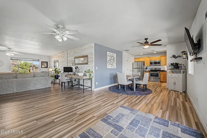Dining space open to living room and kitchen