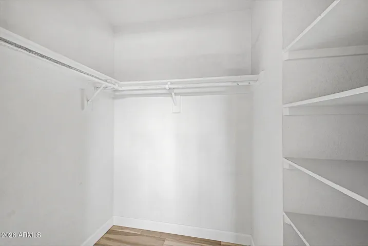 Primary room walk in closet