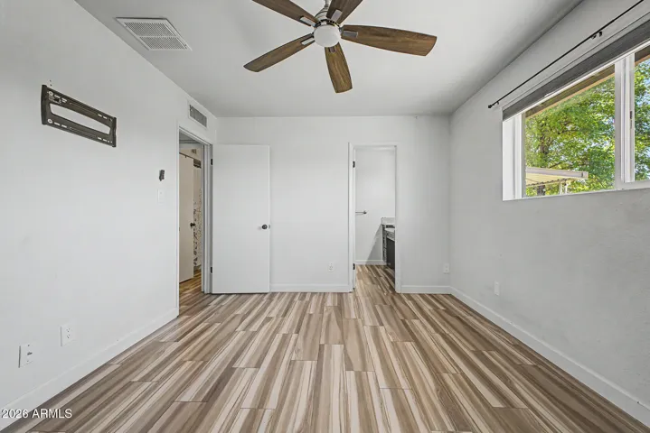 Primary bedroom with walk in closet ad ensuite
