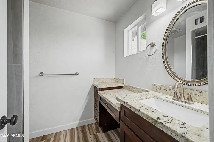 Primary ensuite with granite vanity top