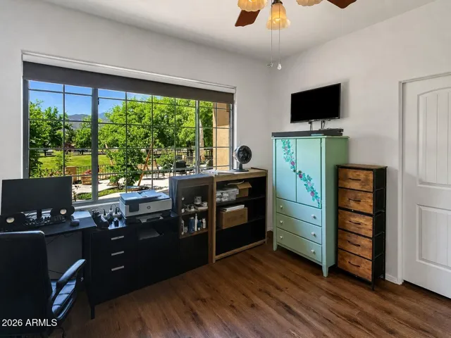 View of pasture through window front bedroom