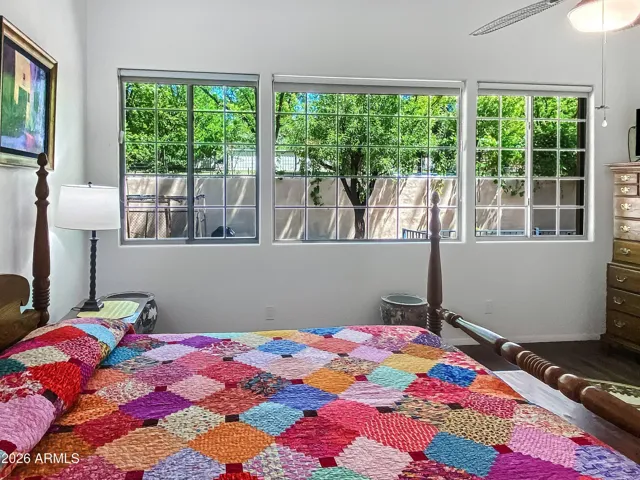 Primary bedroom looking to back yard