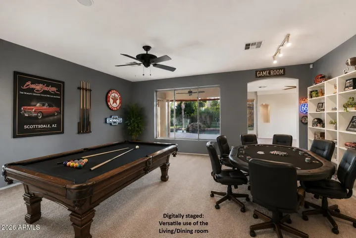 Virtually staged showing Versatile use of Living/Dining room as a Game room