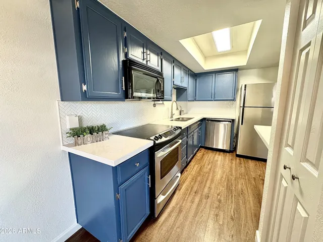 Nice repainted cabinets- Quartz countertops