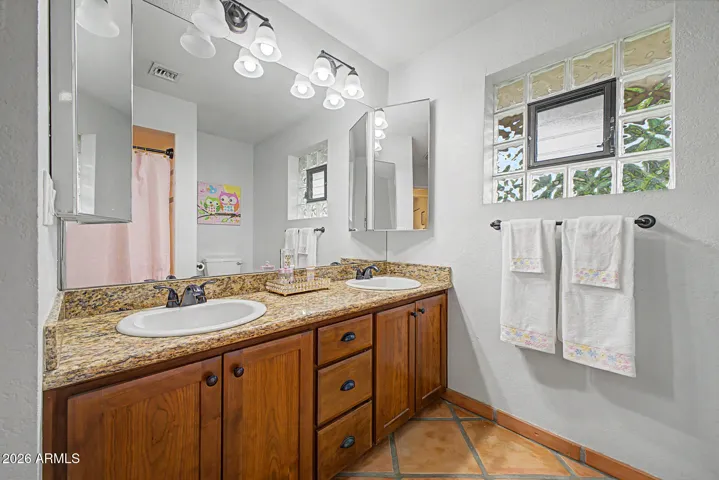 Secondary Bath - tub/shower combo with dual vanities