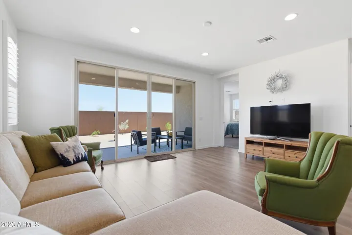 Spacious great room with open floor plan and durable tile flooring throughout