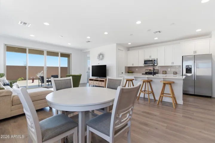 Bright dining space connected to the kitchen and great room, ideal for entertaining.