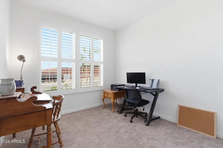 Front bedroom perfect for a home office, guest room, or flex space.