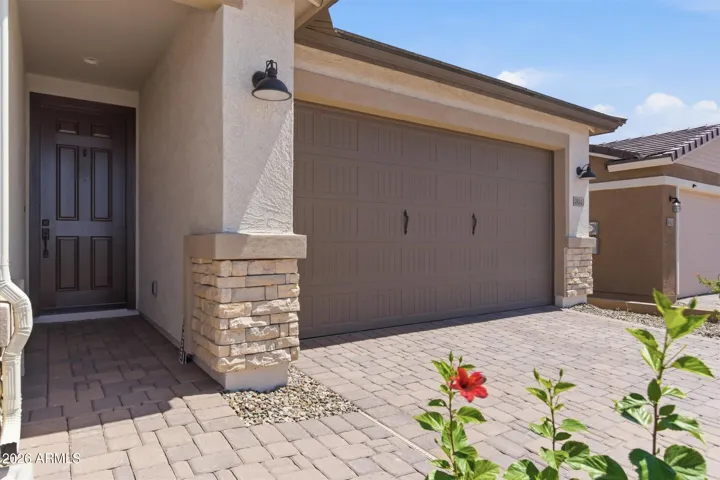 Inviting front entrance with upgraded elevation details and a covered entry for added curb appeal