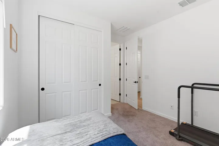 Comfortable bedroom with convenient access to its own en-suite bath for added privacy
