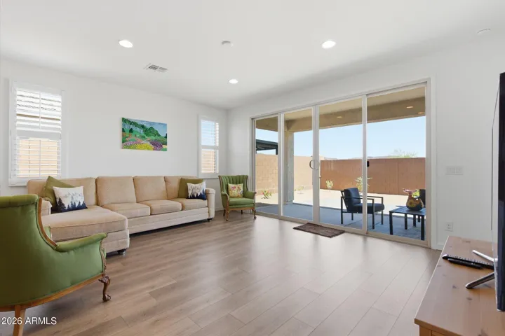Spacious great room with open floor plan and durable tile flooring throughout.