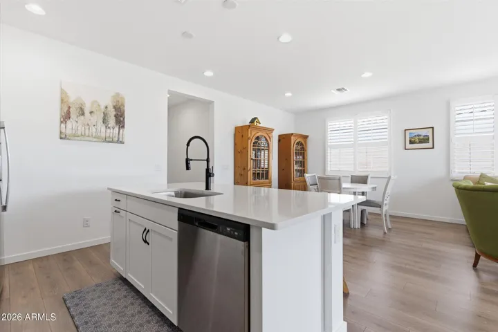 Bright kitchen opening to dining and great room for easy entertaining.