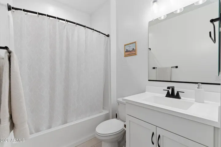 En-suite bathroom with clean finishes and a functional layout for everyday use.