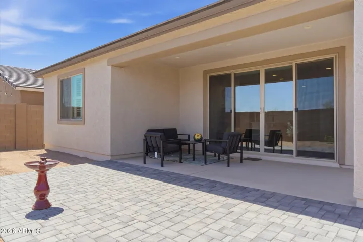 Seamless indoor-outdoor flow from great room to patio.