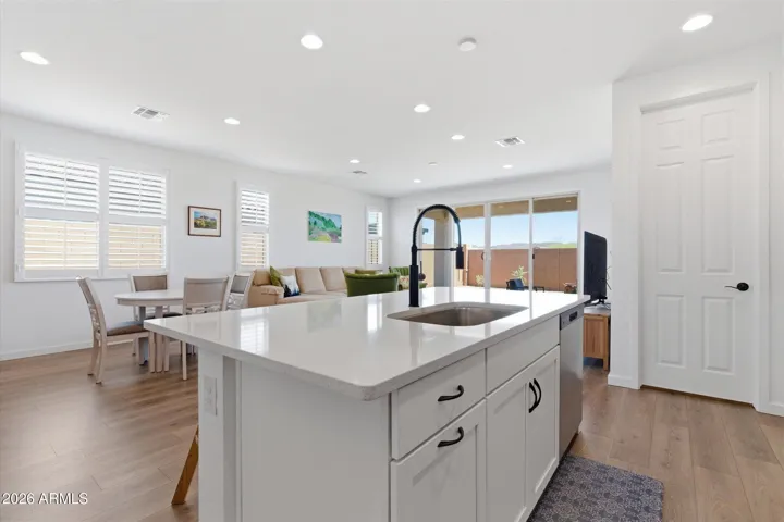 Functional layout with direct access to pantry and dining area.
