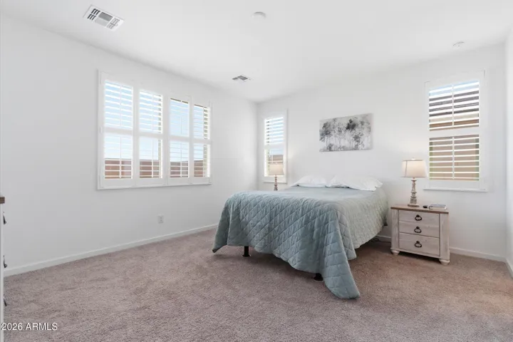Comfortable primary suite with natural light and private feel.