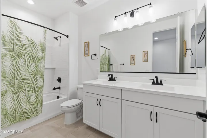 Additional guest bath offering convenience for family or visitors.