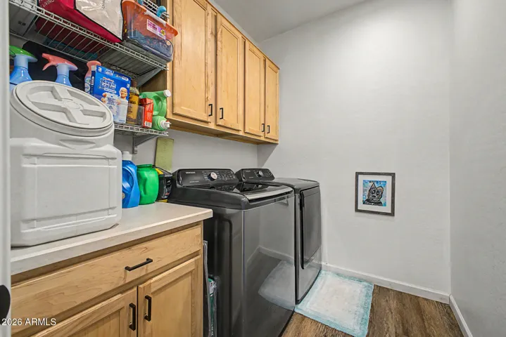 Downstairs laundry room and washer & dryer stay